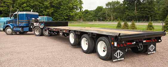 The Benefits of Using Drop Deck Trailers for Oversized and Tall Cargo